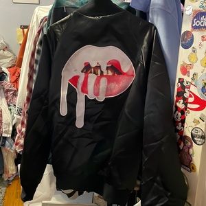 Kylie black satin jacket medium.Never worn,new No tags .Excellent condition!